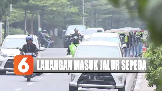 Kendaraan Bermotor Dilarang  Parkir  dan Lintasi Jalur 